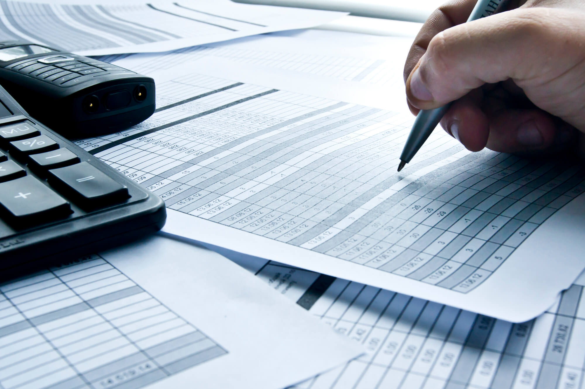 man calculating debt-to-income ratio before getting free debt counseling